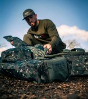 Trakker Pouzdro Na Prut NXC Camo 3 Rod Sleeve (14)